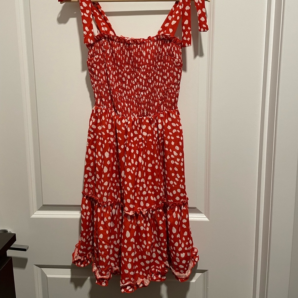 Brand new, flowy and flirty dress, size S. Stretchy.